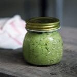 mason jar of mushy peas on a table