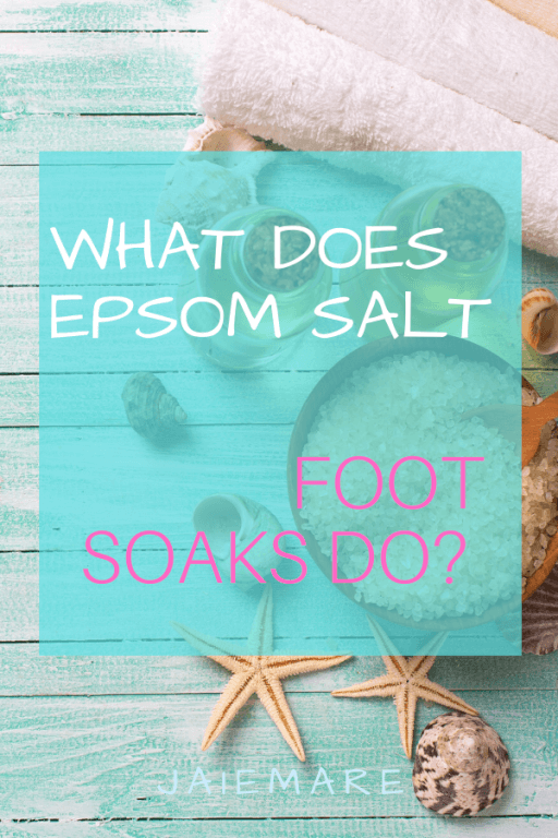 Epsom salts and towels on a beach table. 